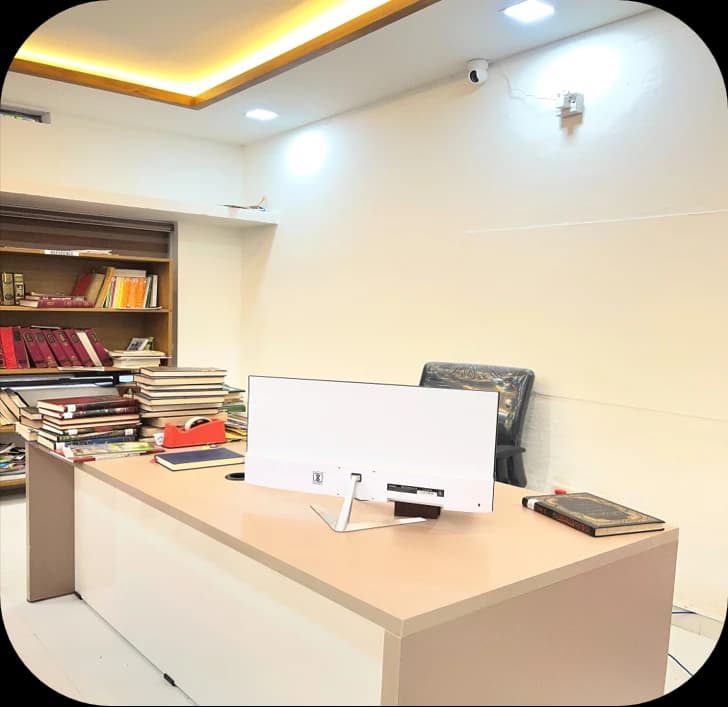 Librarian circulation desk and Koha digital cataloging station